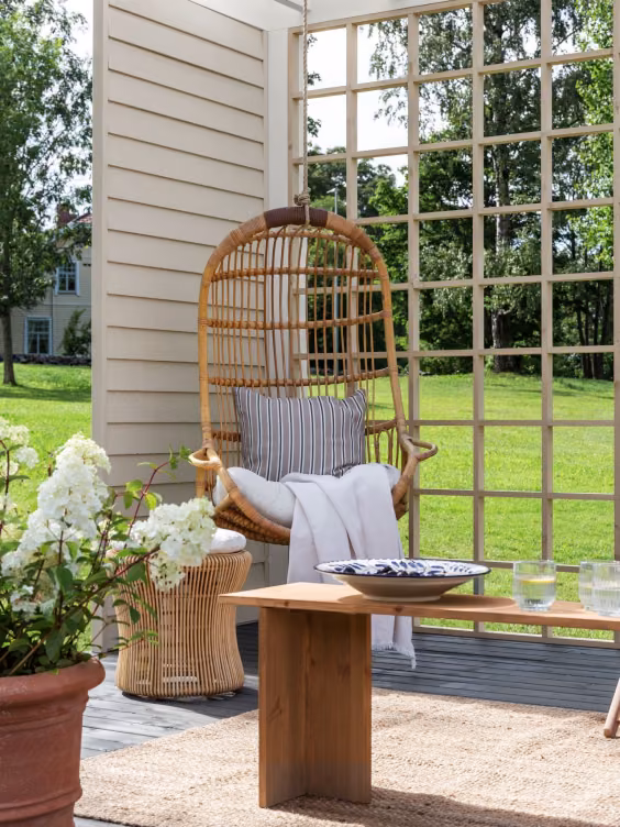 swing chair on garden deck