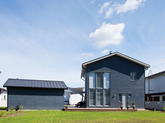 stylish finish of a wooden house painting project