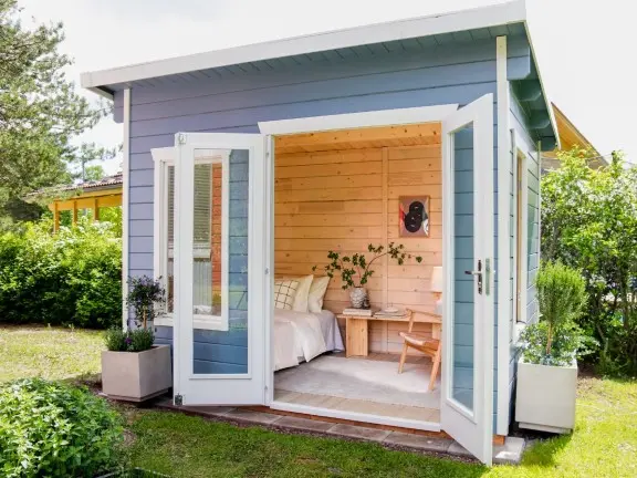 wooden garden cabin with soothing colours