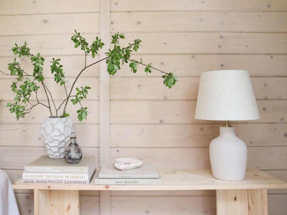 wooden log cabin painted with soothing colours