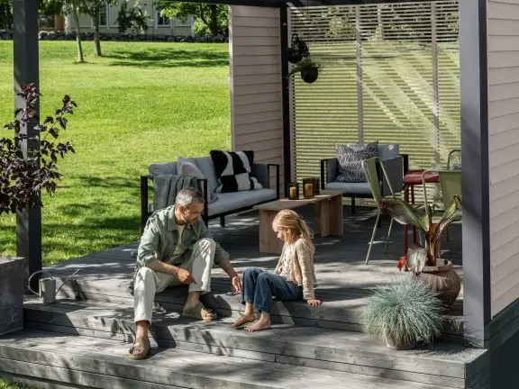 enjoying newly painted wooden decking