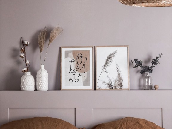 lilac colour wall and matching bed headboard