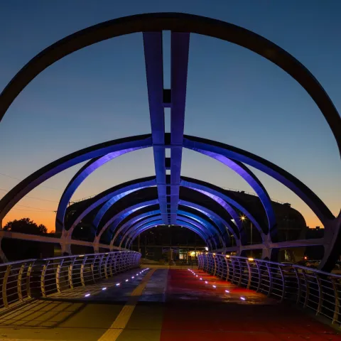 Smart and colourful pedestrian bridge attracts attention with its futuristic form