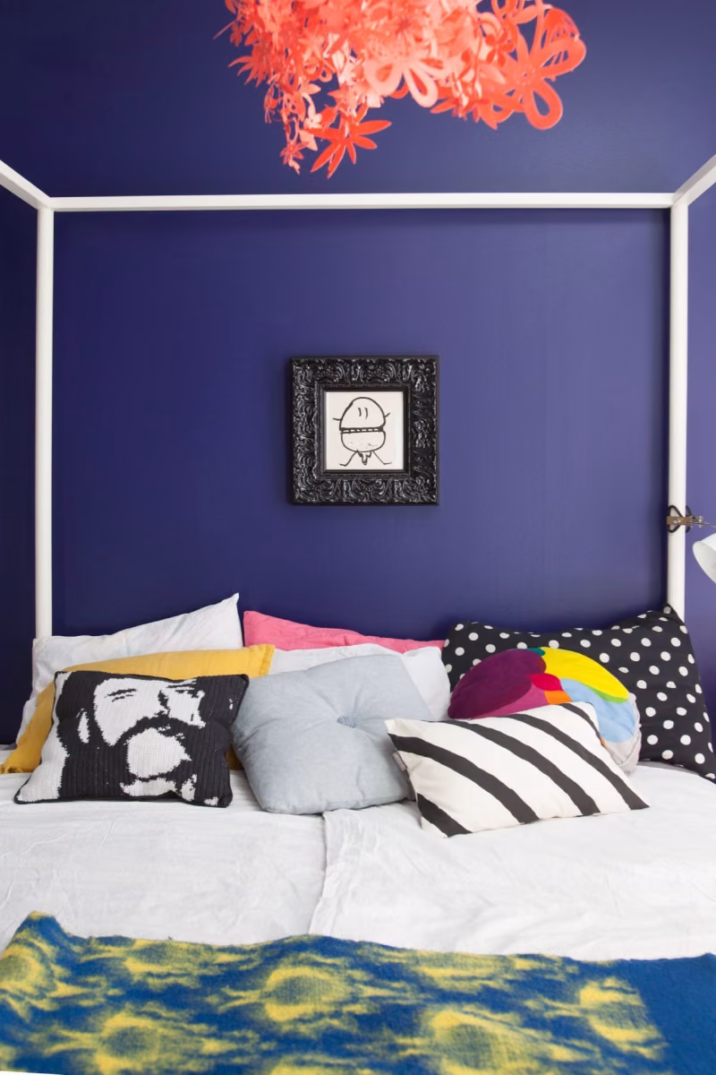 Blue bedroom with a bed